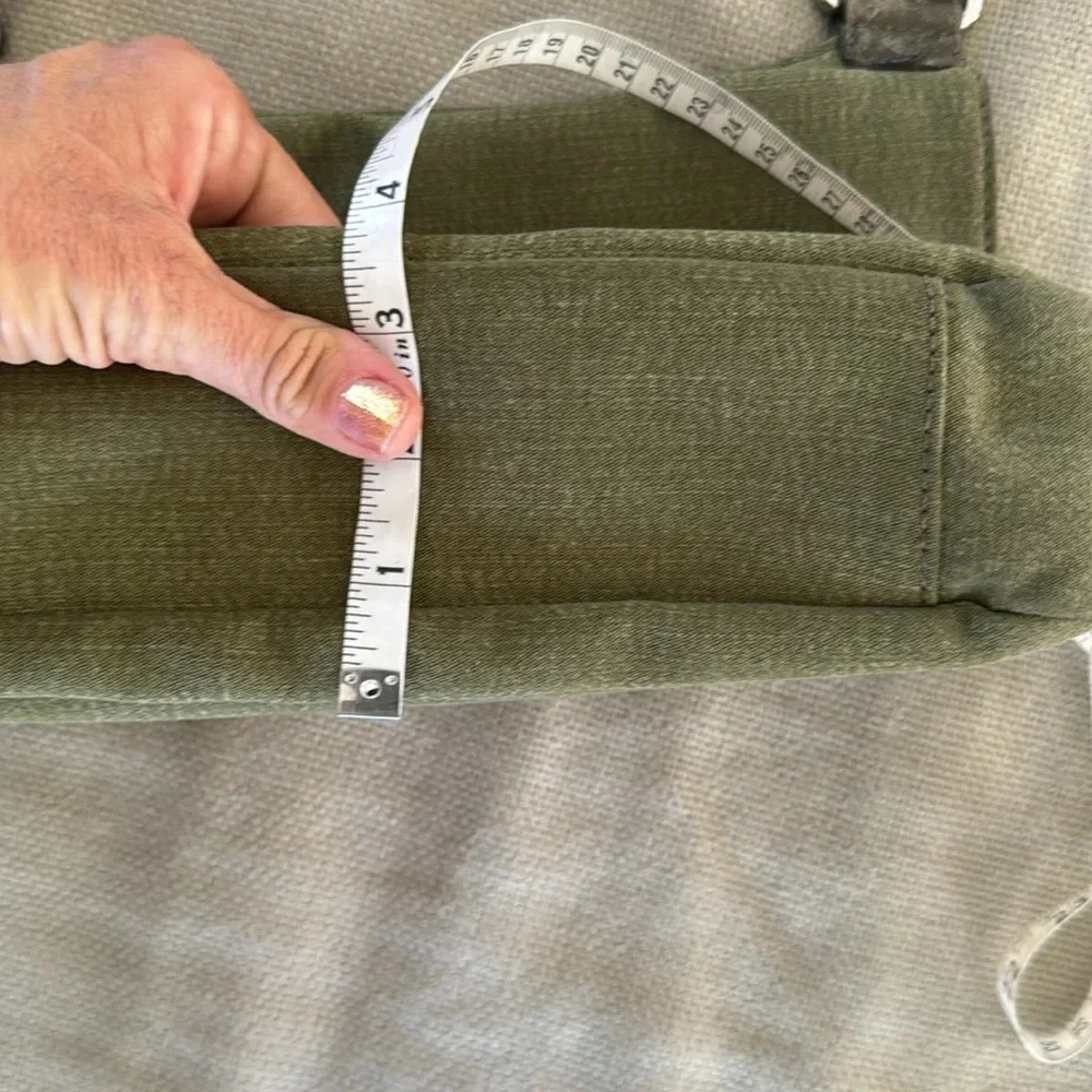 Kipling moss green with colbalt blue lining crossbody bag